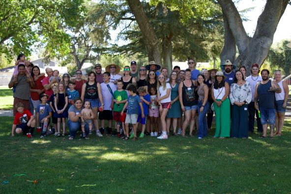 image of group of students and families outside. 